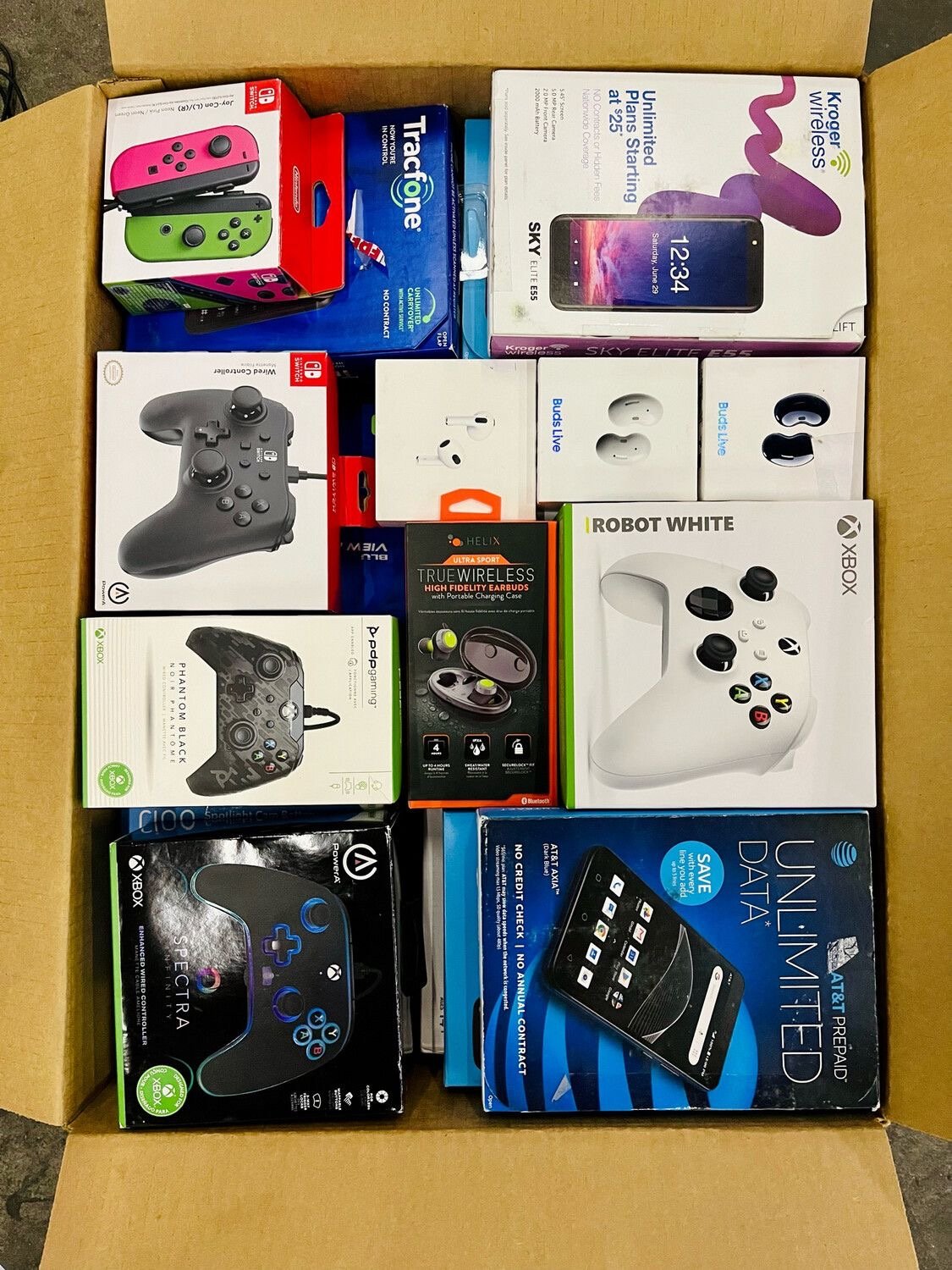 Video game liquidation pallets with mixed games and gaming accessories